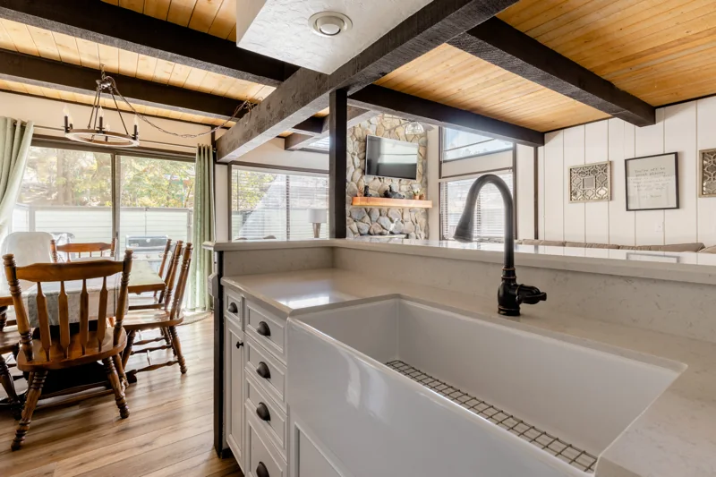 Kitchen with a breakfast counter opening toward the dining table